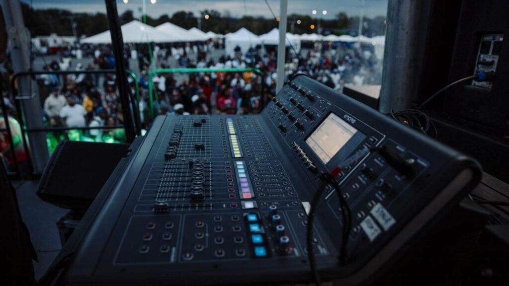 Midas digital mixing console set-up in the monitor world position on the side of the main stage.