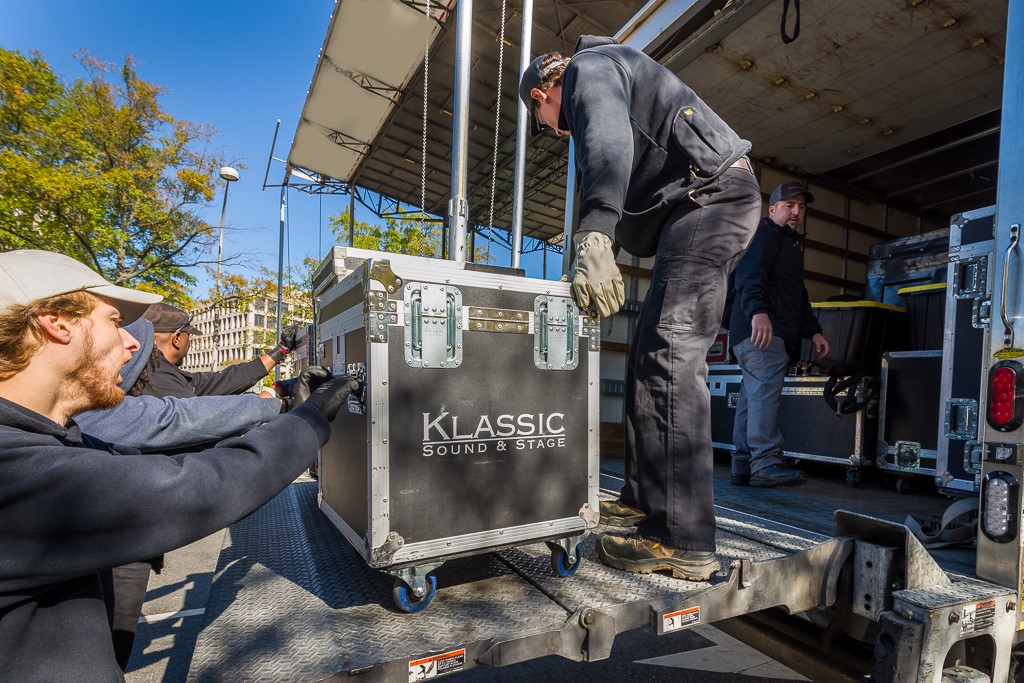 Klassic sound and stage crew unloading the first road cases for audio set-up in Washington DC